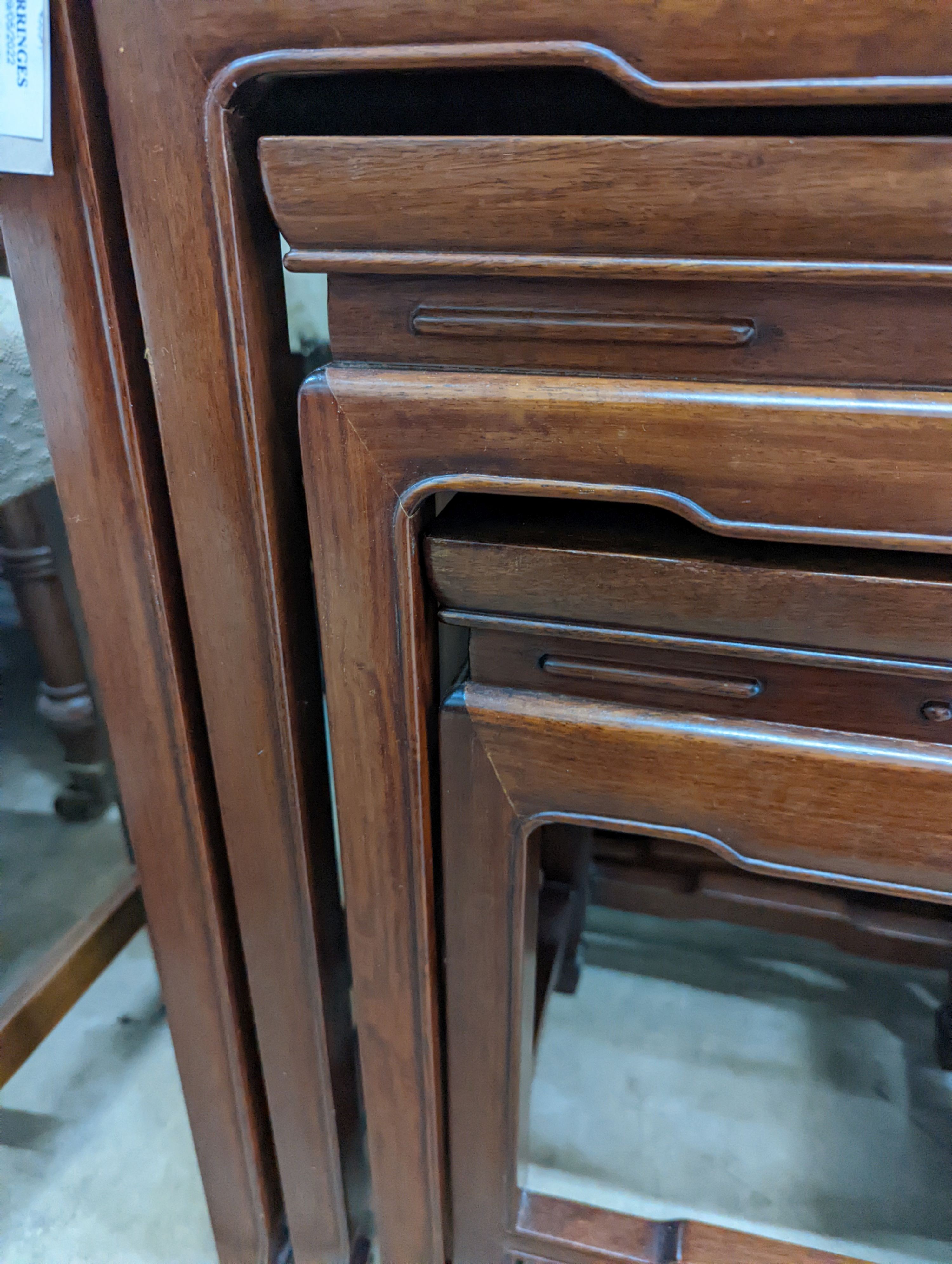 A quartetto of rectangular Chinese hardwood tea tables, width 49cm, depth 34cm, height 70cm